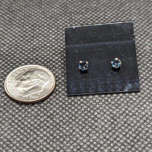 Tiny tanzanite studs